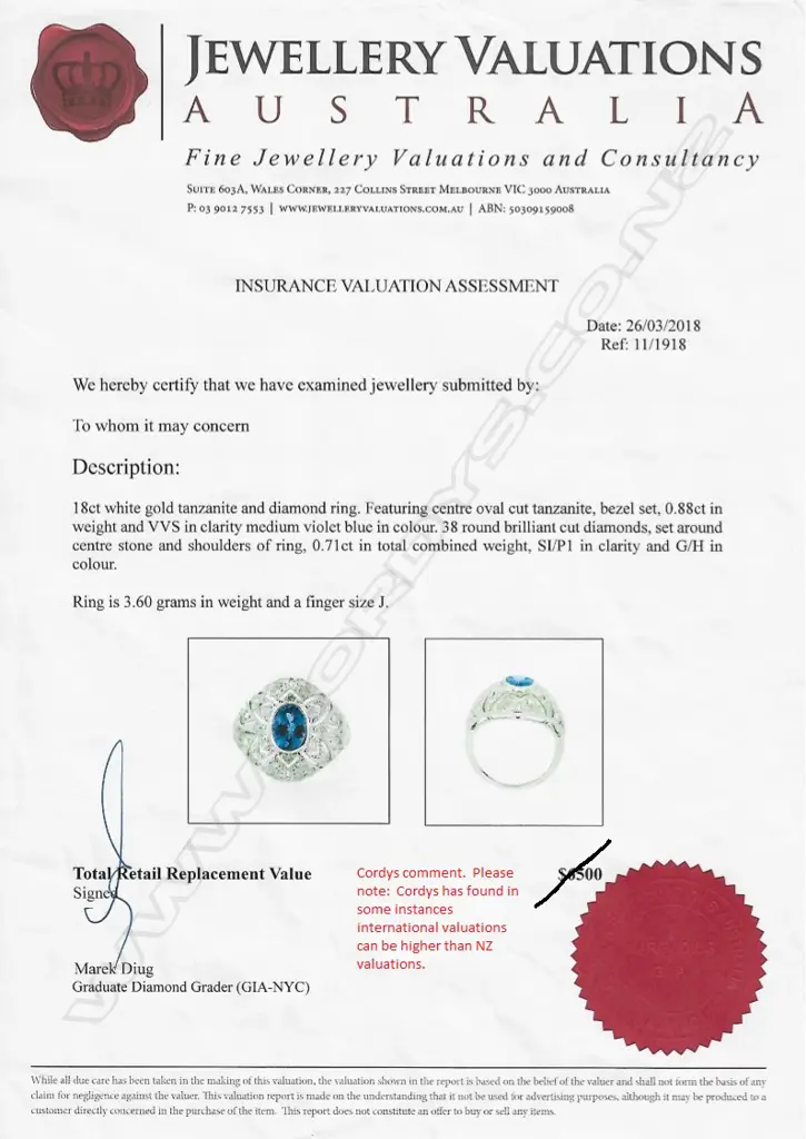 An 18ct white gold tanzanite and diamond Art Deco style ring Image 1++