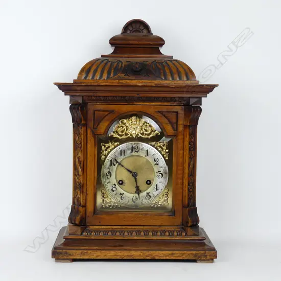 A Victorian oak cased mantel clock