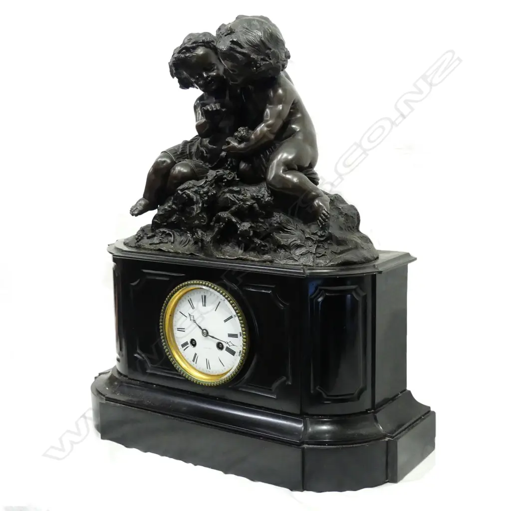 A Victorian black marble mantel clock Image 1++