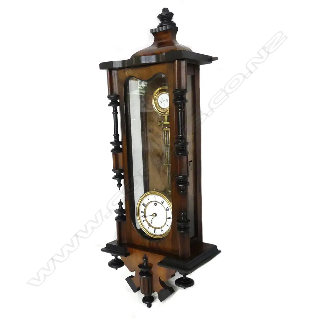 A wall clock in the style of a Vienna regulator Image 1++