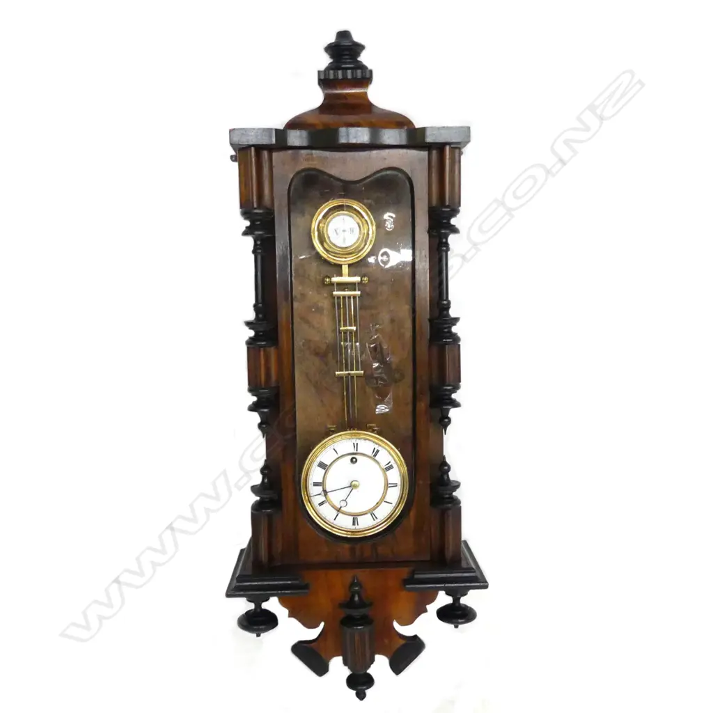 A wall clock in the style of a Vienna regulator Image 1++