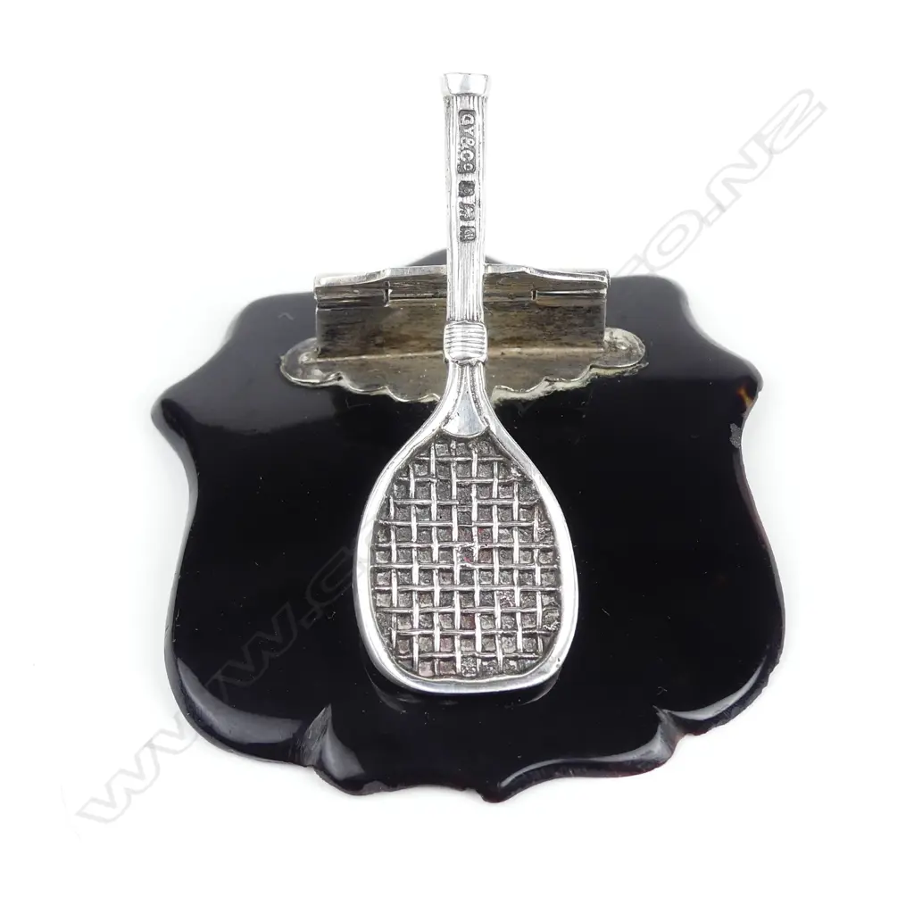 An Edwardian novelty silver tennis racquet and tortoiseshell paper clip Image 1++