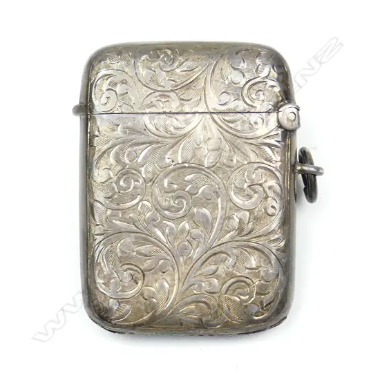 A silver vesta case