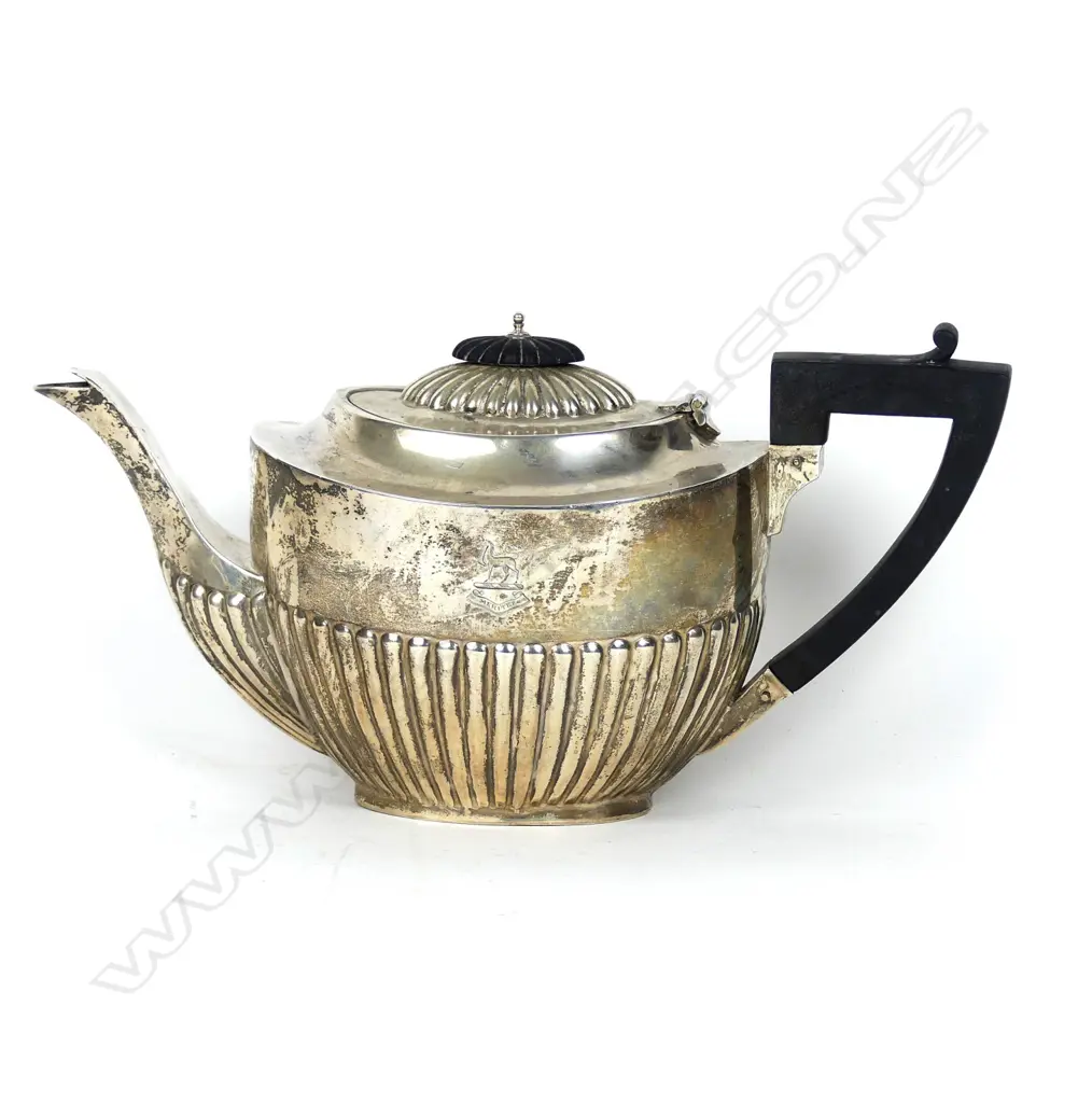 An early 1900s silver teapot Image 1++