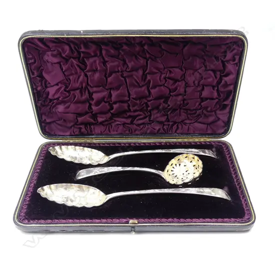 A cased set of silver berry spoons and sifter spoon