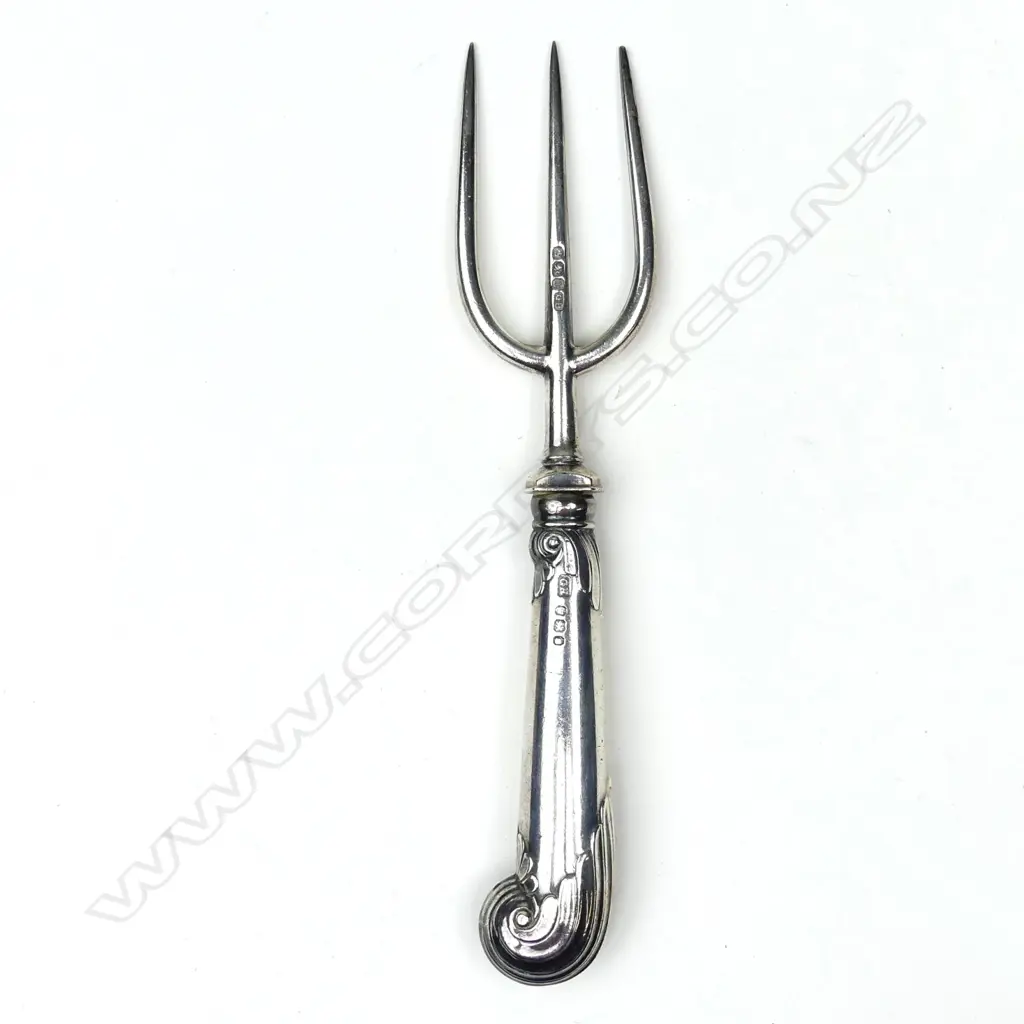 A silver bread fork Image 1++