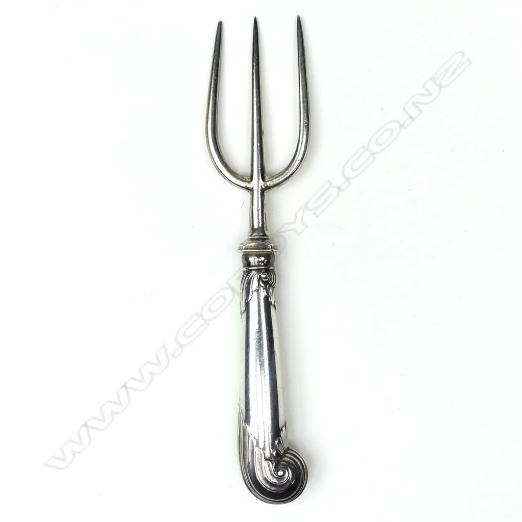 A silver bread fork Image 1++