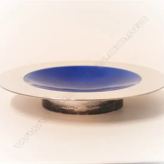 A Georg Jensen silver dish with blue enamel lining