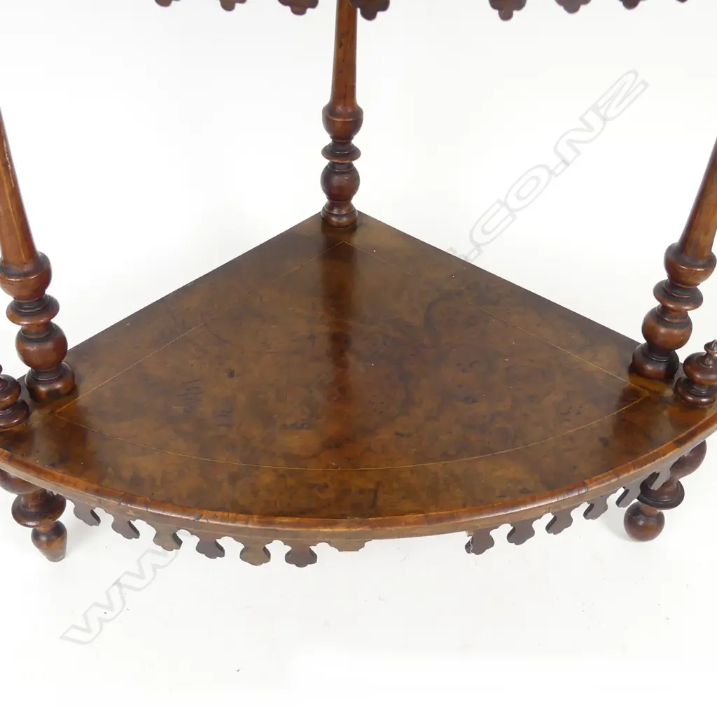 A Victorian figured walnut four tier whatnot Image 1++