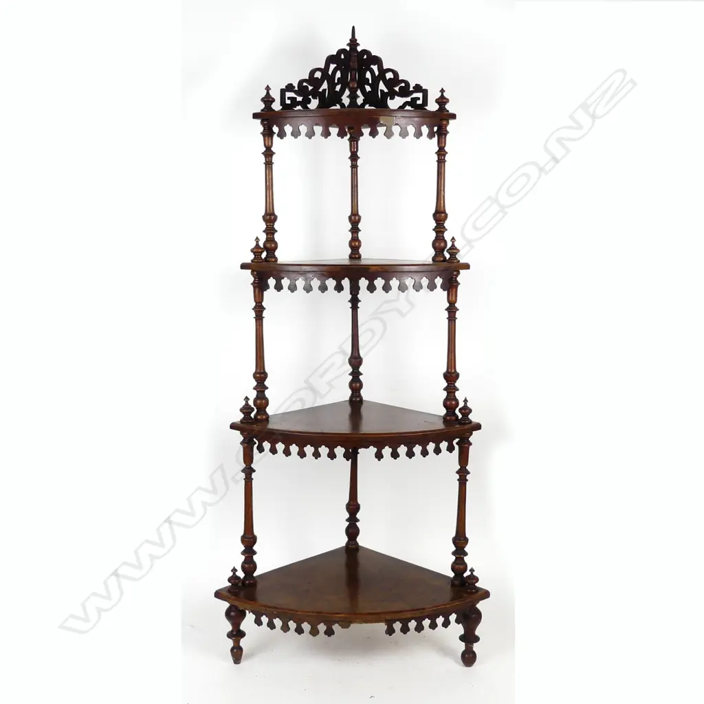 A Victorian figured walnut four tier whatnot Image 1++
