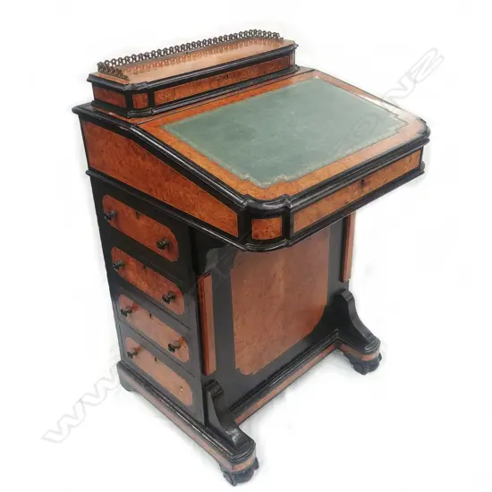 A Victorian burr walnut davenport