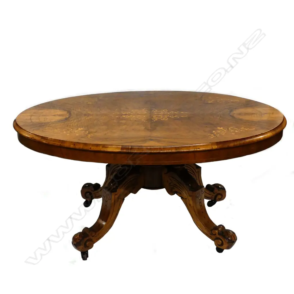 A Victorian small walnut occasional table Image 1++