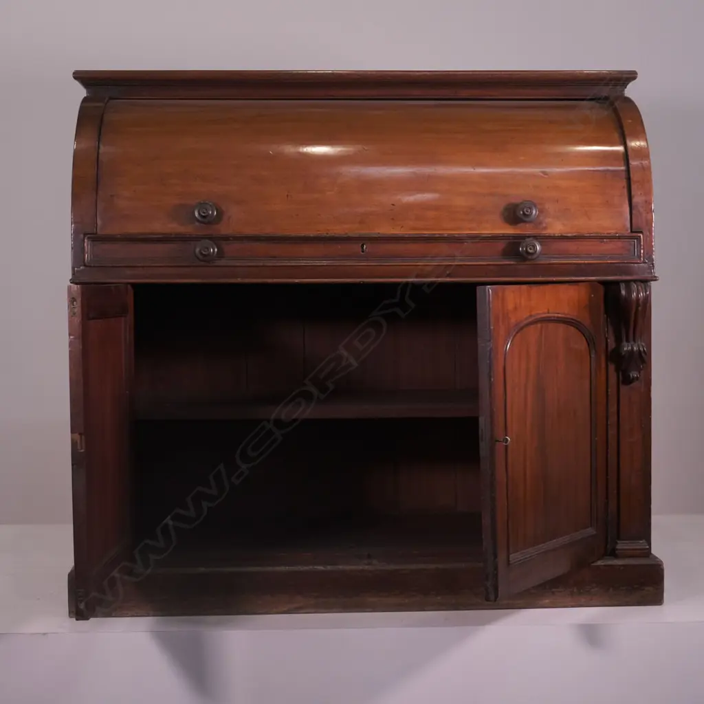 A Victorian mahogany roll-top drum cylinder desk Image 1++