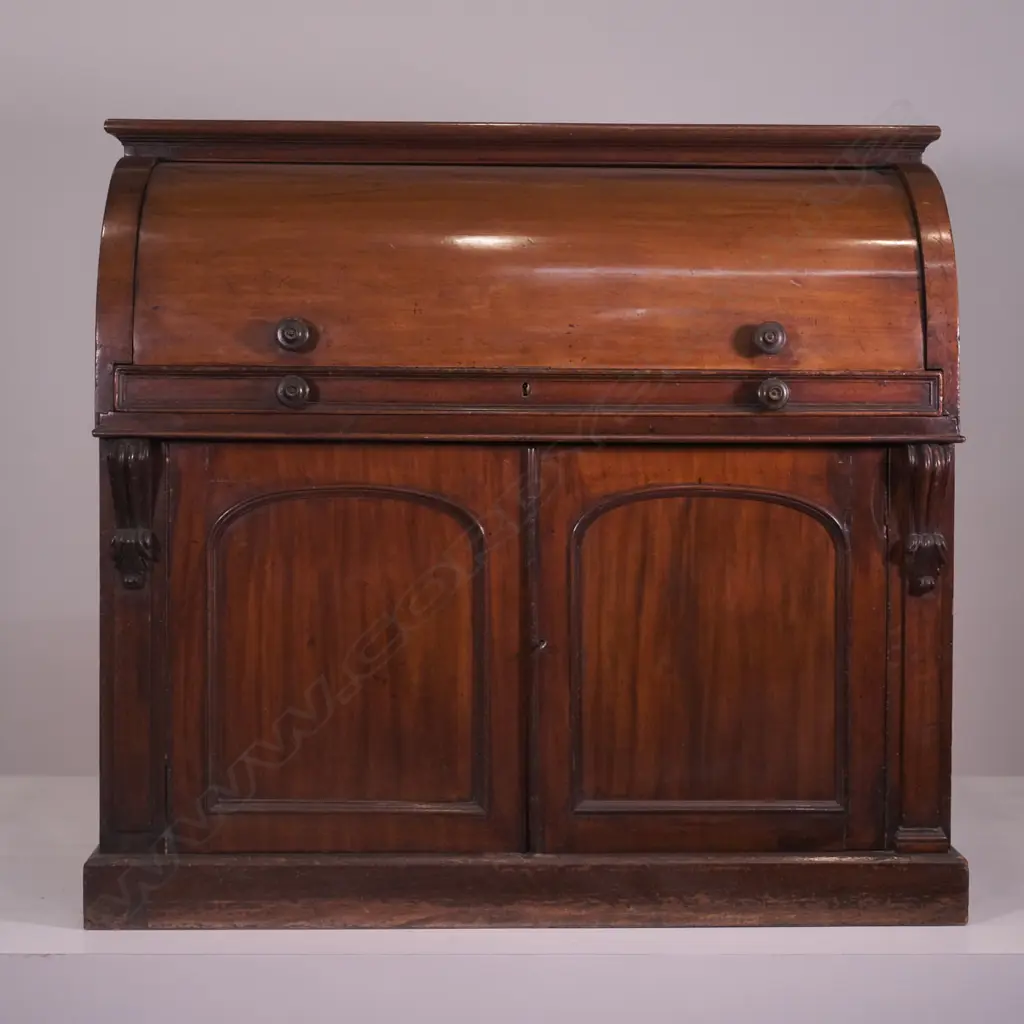 A Victorian mahogany roll-top drum cylinder desk Image 1++