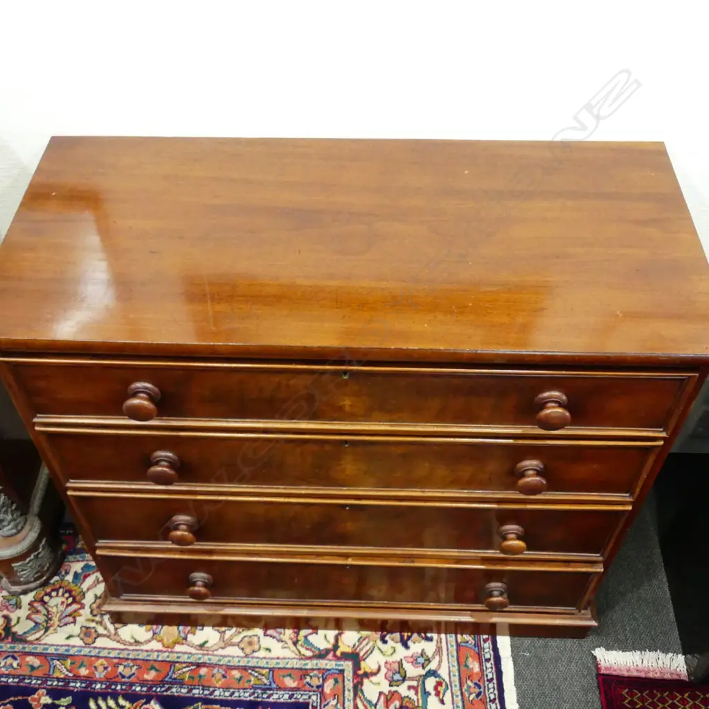 A Victorian mahogany flat front four drawer chest Image 1++