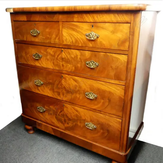 A Victorian mahogany flat front five drawer chest