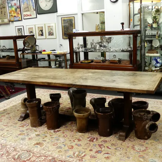 An antique country oak refectory dining table