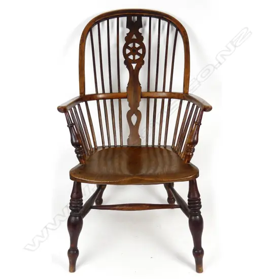 An 19thC English birch and elm Windsor elbow chair