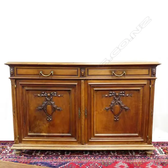 A 19thC French walnut small sideboard