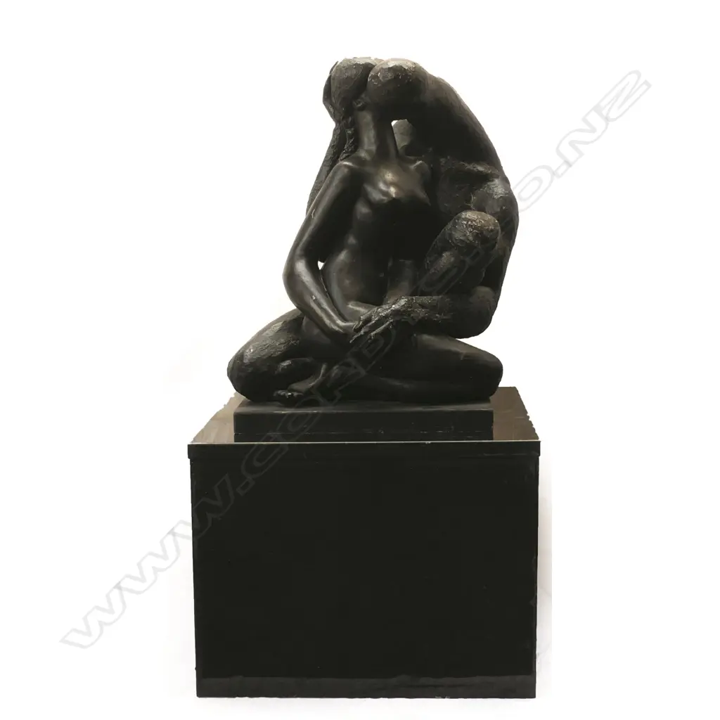A large composite/plaster sculpture of an embracing couple Image 1++