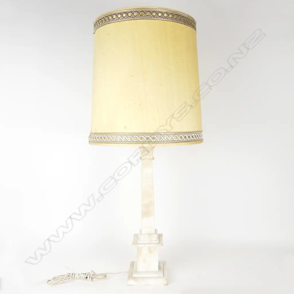 An alabaster column based table lamp Image 1++