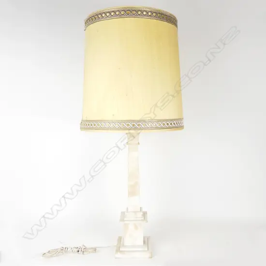 An alabaster column based table lamp