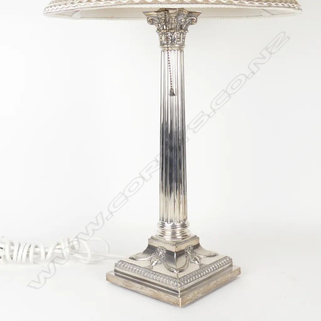 A silver plated Corinthian column based table lamp Image 1++