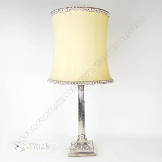 A silver plated Corinthian column based table lamp