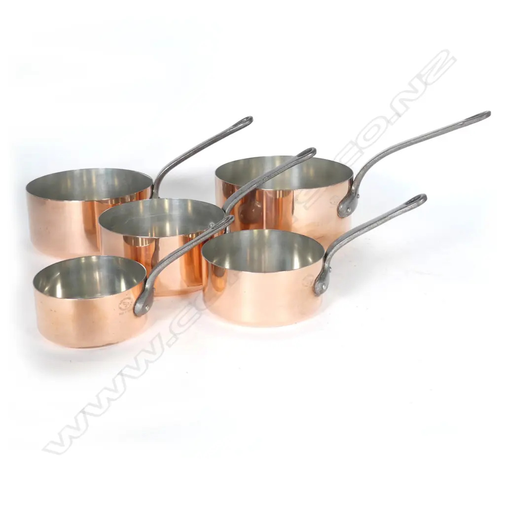A set of five graduating French copper pots Image 1++
