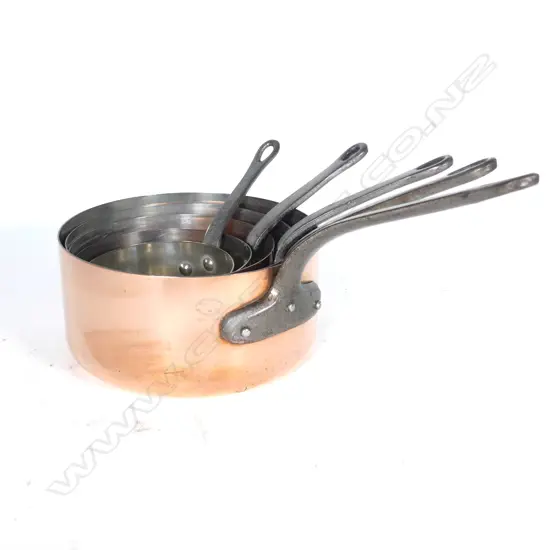 A set of five graduating French copper pots