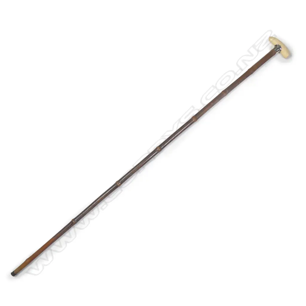 A c.1900 small whale's tooth and bamboo walking stick Image 1++