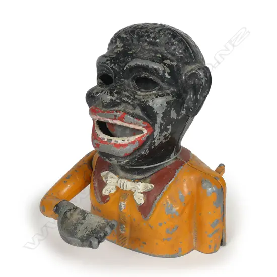 A rare Greedy Boy money box