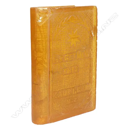 A c.1900 sculpted kauri gum book