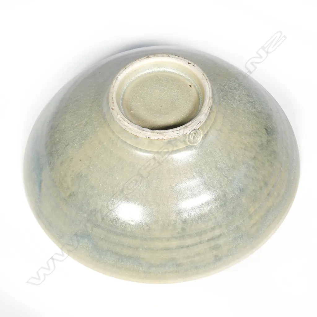 Doreen Blumhardt (1914-2009) flared pedestal bowl. The interior with red dots highlighted with yellow and with dark bands. Impressed potters mark. Dia.248mm. Image 1++