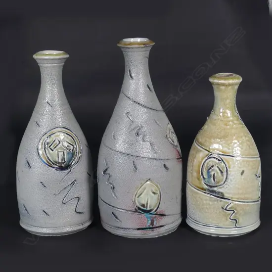 Three Peter Lange salt glazed bottles