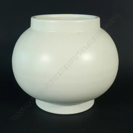 A Crown Lynn hand potted small vase