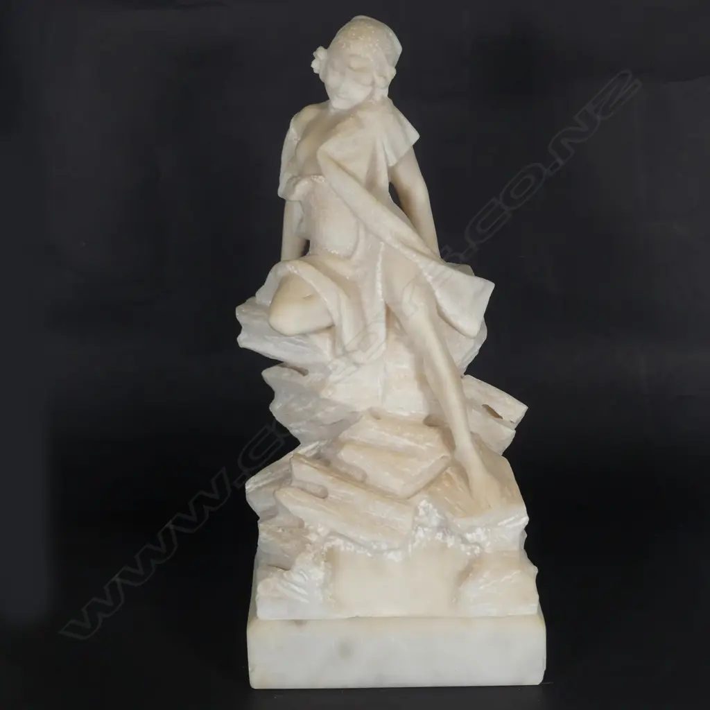 An Art Deco carved alabaster figure Image 1++