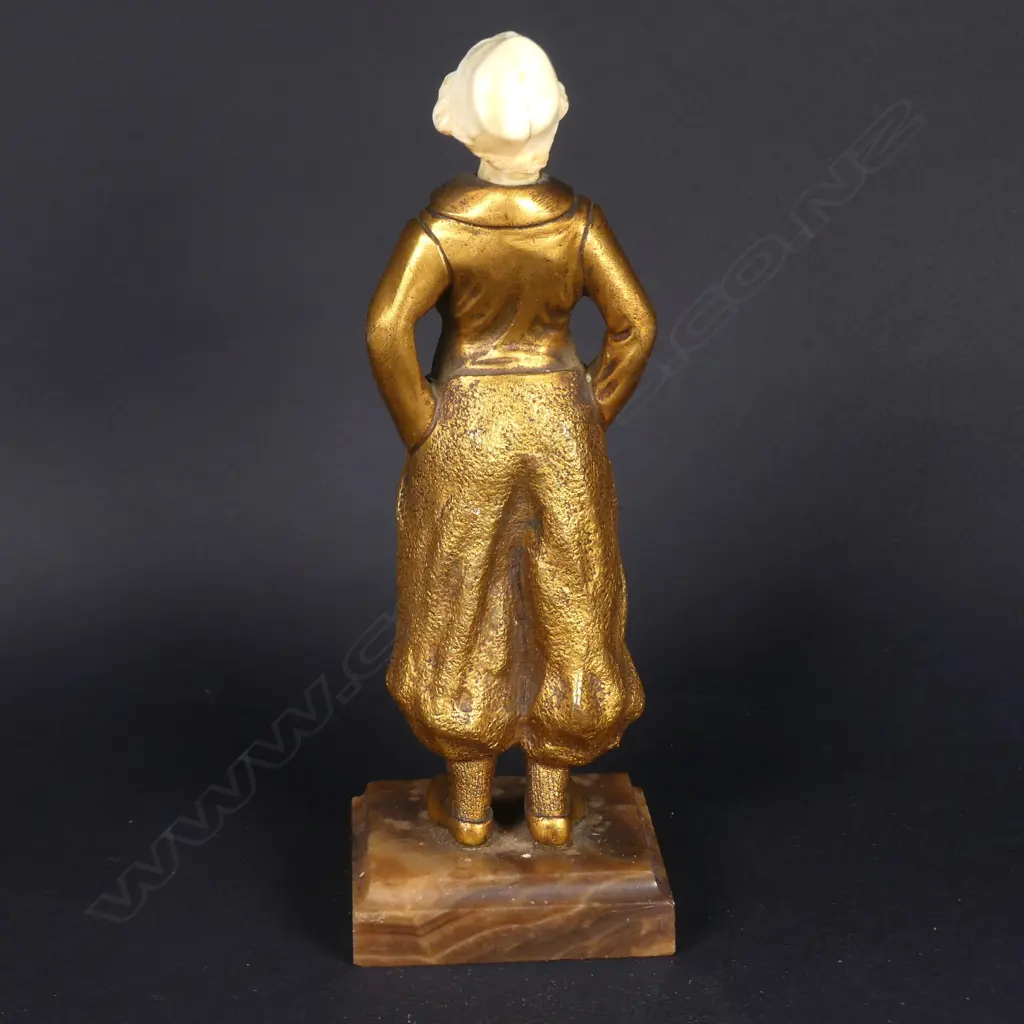 A gilt bronze and ivory figure of a Dutch boy Image 1++