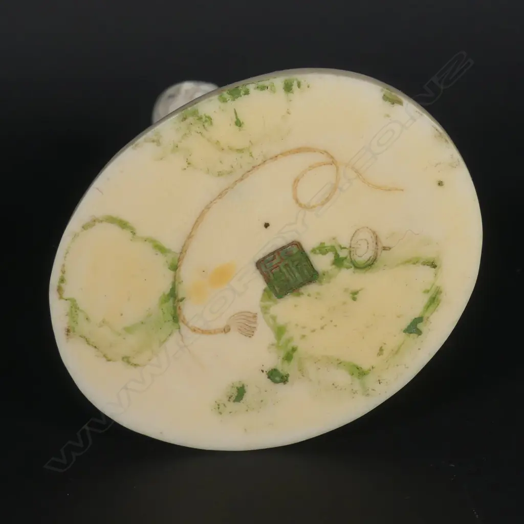 A Japanese Meiji period ivory okimono of a basket seller Image 1++