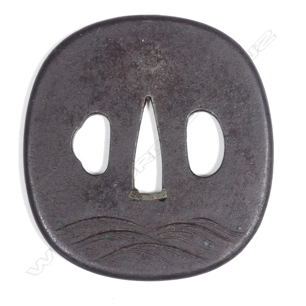 A Japanese iron tsuba Image 1++
