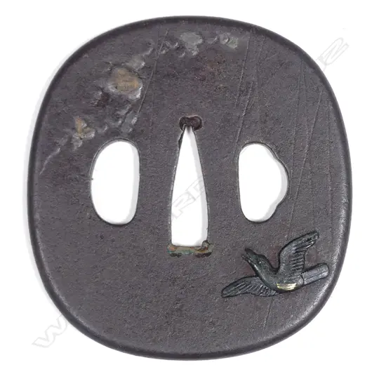A Japanese iron tsuba