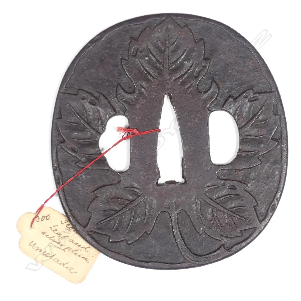 An Umetada School iron tsuba Image 1++