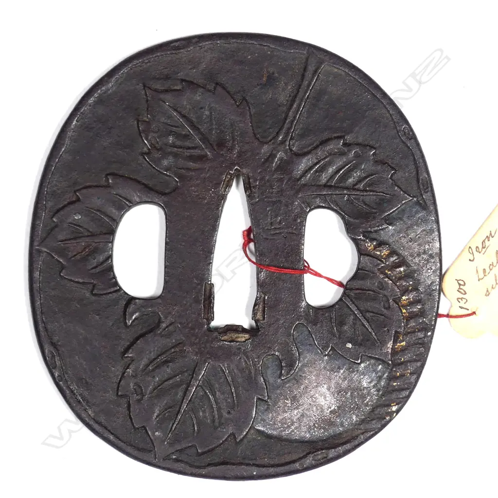 An Umetada School iron tsuba Image 1++