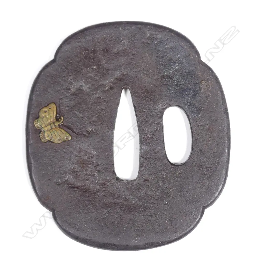 A cast iron tsuba Image 1++