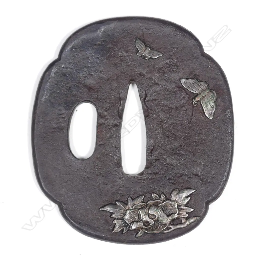 A cast iron tsuba Image 1++