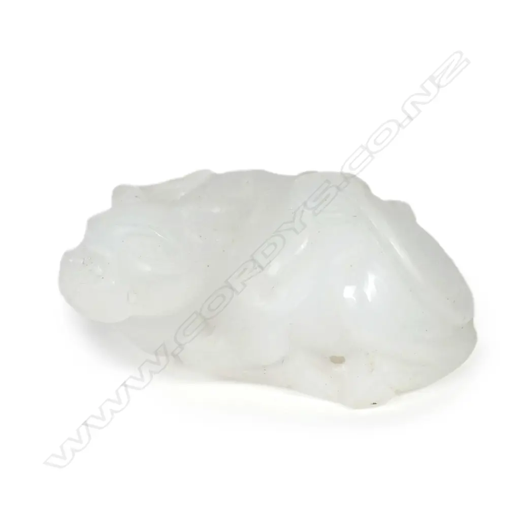 A well carved Chinese white jade recumbent bull Image 1++