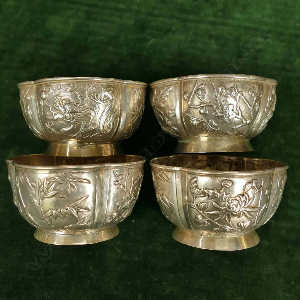 Four Chinese silver small bowls Image 1++