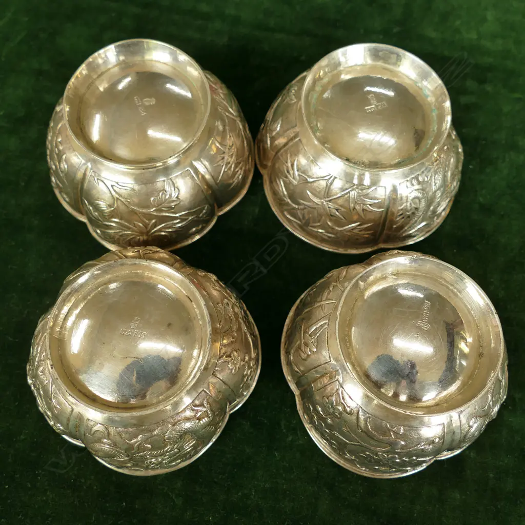 Four Chinese silver small bowls Image 1++