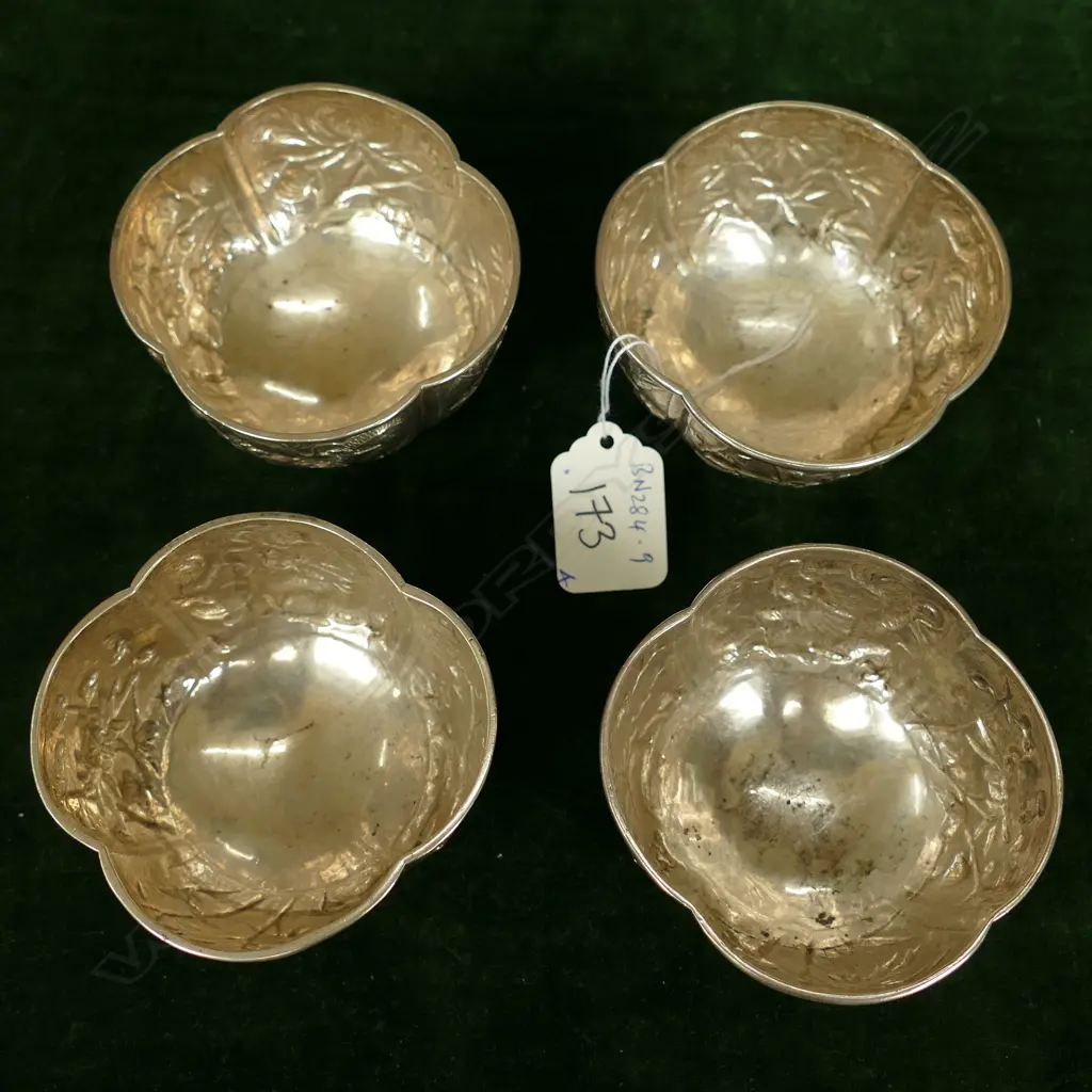 Four Chinese silver small bowls Image 1++