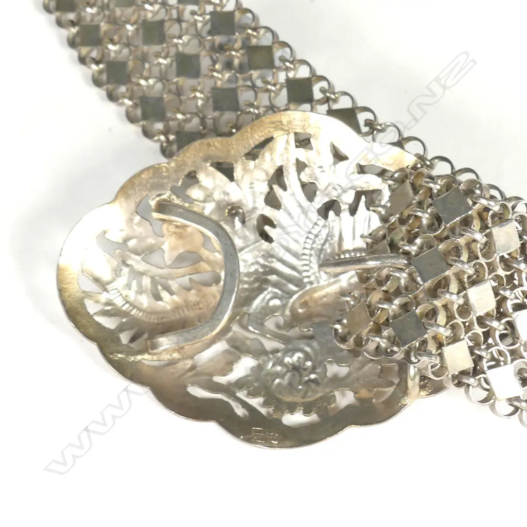 An Oriental vintage silver buckle and belt Image 1++